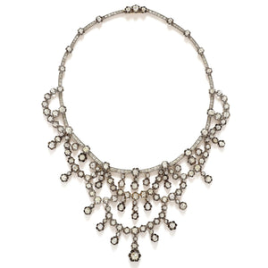 A XIX Century silver topped, Yellow gold and old-cut diamond necklace of draperie design.