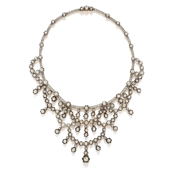 A XIX Century silver topped, Yellow gold and old-cut diamond necklace of draperie design.