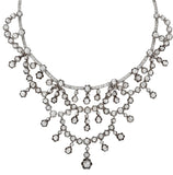 A XIX Century silver topped, Yellow gold and old-cut diamond necklace of draperie design.