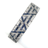 An Art Déco platinum diamond and sapphire bracelet. 1925